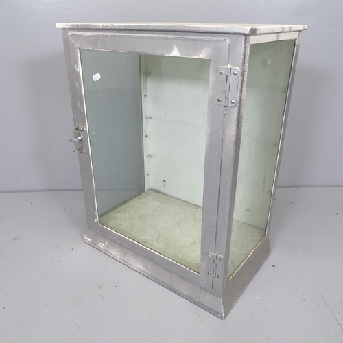 2629 - A vintage painted metal medicine cabinet, with glass panelled door and sides. 48x62x32cm. Lacking sh... 