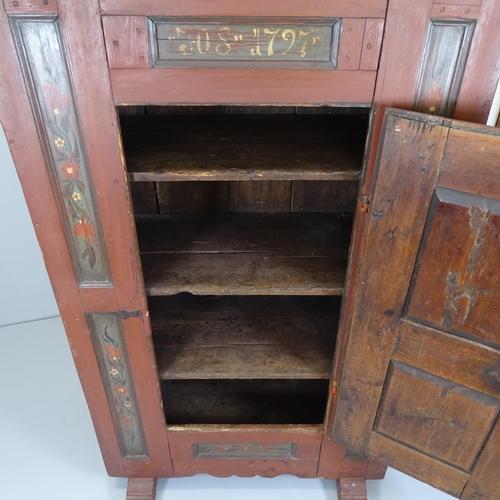 2637 - An 18th century continental folk art painted marriage armoire, with single panelled door and shelf-f... 