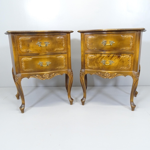 2639 - A pair of modern mahogany veneered two drawer bedside chests of canted form. 56x60x36cm.