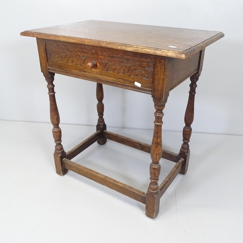 2651 - A reproduction oak side table with single frieze drawer and all around stretcher. 72x75x46cm.