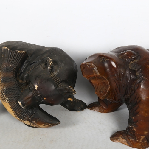 295 - 2 similar Hokkaido style pine bear sculptures, 1 with salmon in mouth, largest length 30cm (2)