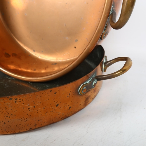 317 - 2 copper 2-handled jam pans, largest diameter 38cm (2)