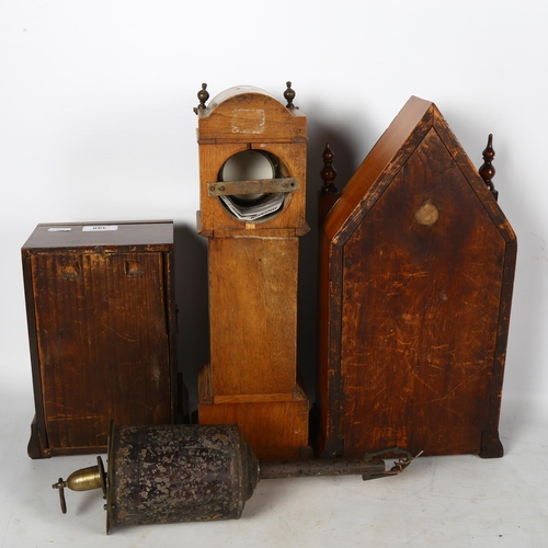 398 - A longcase style clock by Evans of Uckfield, 40cm, a lancet clock with church illustration, and anot... 