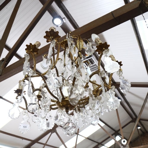 424 - A gilt-brass chandelier with large cut lustre drops, diameter approx 55cm