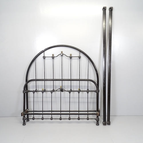 2658 - A Victorian cast iron 4' small double bed. With side rails, no slats.