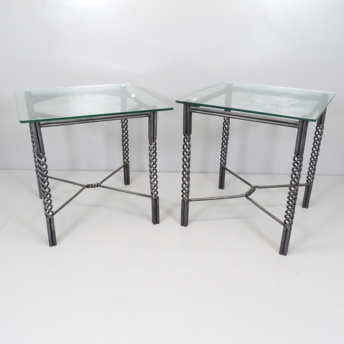 2661 - A pair of similar square glass top occasional tables on wrought iron base. Largest 60x62cm.