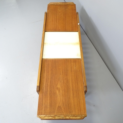 2668 - A mid-century teak two-tier extending coffee table, with label for Remploy. 113x41x45cm.