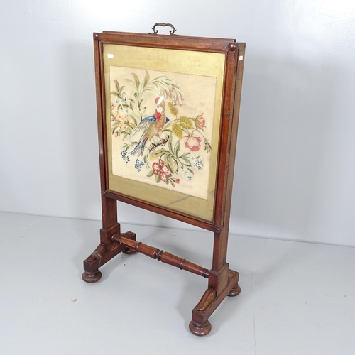 2676 - An Antique William IV mahogany-framed firescreen, with needlework upholstered panel. 62x100x35cm