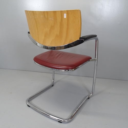 2685 - A mid-century style leather upholstered desk chair on tubular steel frame, with bent ply back.