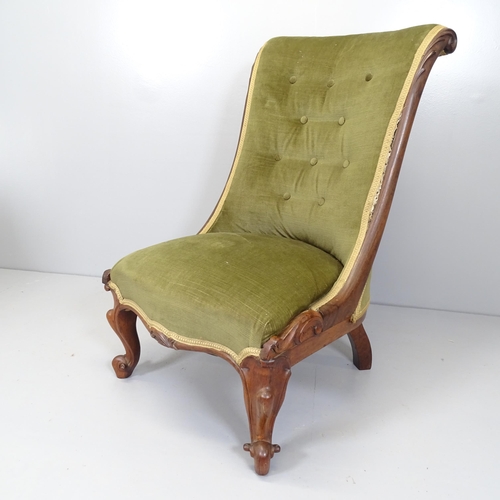 2686 - A Victorian mahogany and button back upholstered slipper chair, on cabriole legs with carved deorati... 