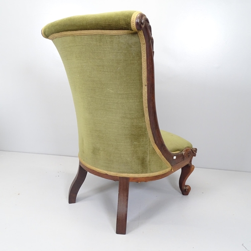 2686 - A Victorian mahogany and button back upholstered slipper chair, on cabriole legs with carved deorati... 