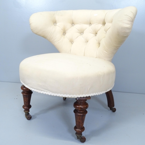 2687 - A Victorian button back upholstered bow arm parlour chair with mahogany show wood.