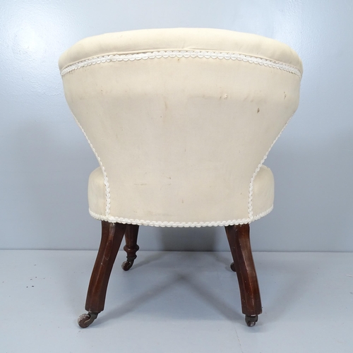 2687 - A Victorian button back upholstered bow arm parlour chair with mahogany show wood.