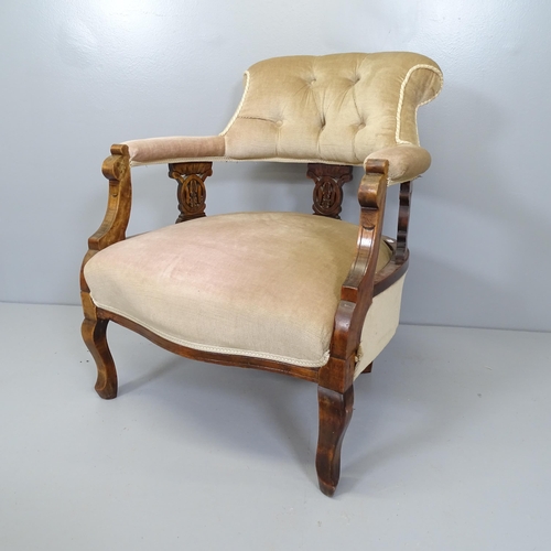 2688 - A Victorian mahogany and button-back upholstered bow arm lounge chair.