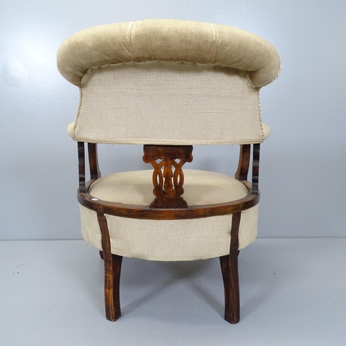 2688 - A Victorian mahogany and button-back upholstered bow arm lounge chair.