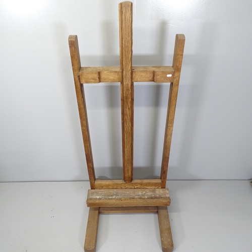 2690 - An antique oak adjustable artist's easel.