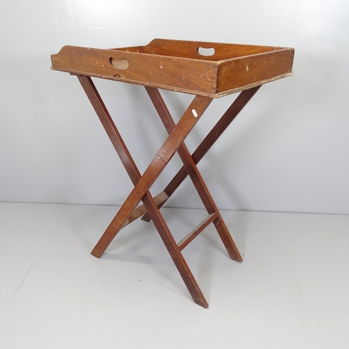 2693 - An antique mahogany butler's tray on stand. Overall 75x100x50cm