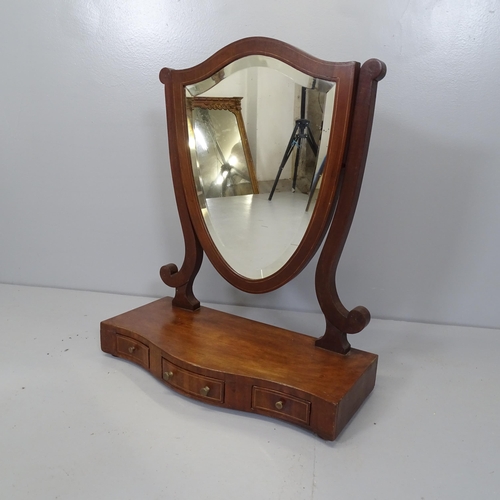 2705 - A Victorian mahogany shield-shaped swing toilet mirror with drawer fitted base. 56x68x27cm