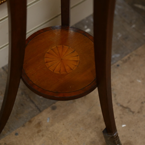 100 - A Victorian satinwood-banded mahogany jardiniere stand, with brass liner and shell marquetry decorat... 