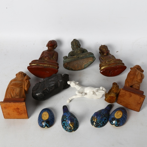 106 - A group of Chinese figures and Buddhas, to include a yellow flecked Buddha, 2 carved wood Buddhas, a... 