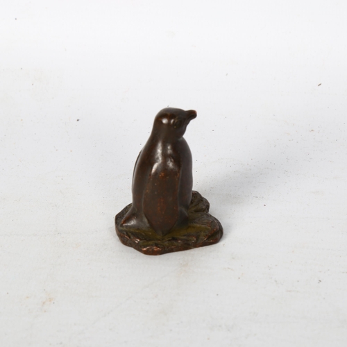 107 - A Chinese patinated bronze penguin on rocky base, H5cm