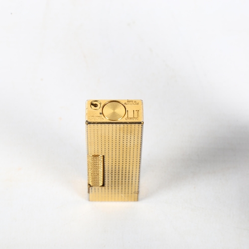 125 - A gold plated Dunhill lighter in original box