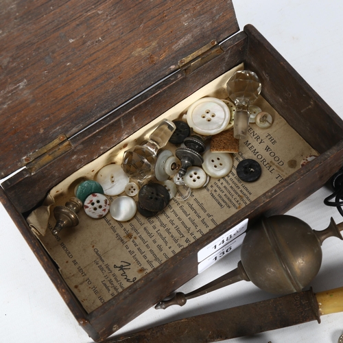 136 - A box of various items, to include a dagger, a silver pencil, miniature elephant, pillbox etc