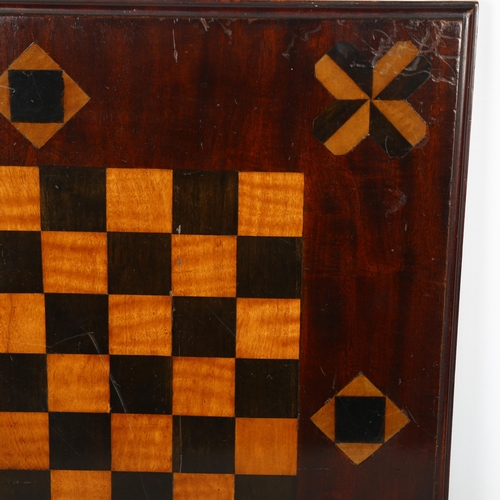 156 - A 19th century parquetry inlaid mahogany games board, 46cm x 46cm