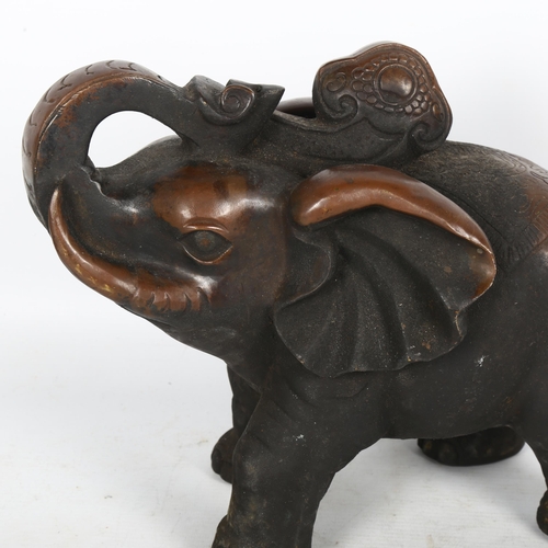 162 - A large Indian bronze elephant, with engraved decoration, H26cm