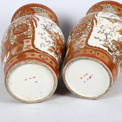 167 - A pair of Antique Japanese Kutani vases, with character marks to the base, height 30cm