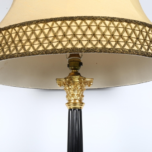 17 - A gilt-metal Corinthian column table lamp and shade, height including shade 89cm, height to top of b... 