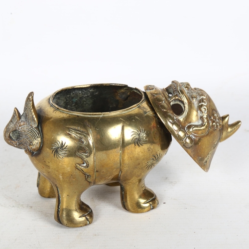 183 - A Chinese brass dog of fo censer, with engraved and embossed decoration and hinged lid, H12cm