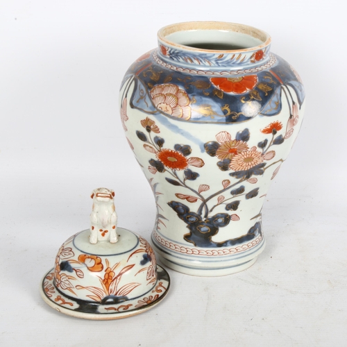 185 - A Chinese Imari baluster vase and cover, lid surmounted by a dog of fo, H30cm