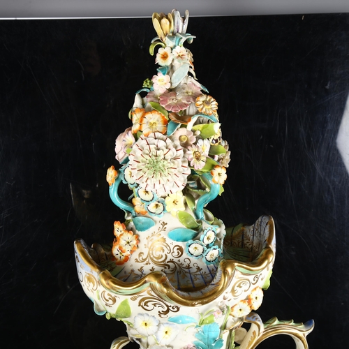 193 - A large Coalbrookdale style vase and cover, with allover applied flowers, painted and gilded decorat... 