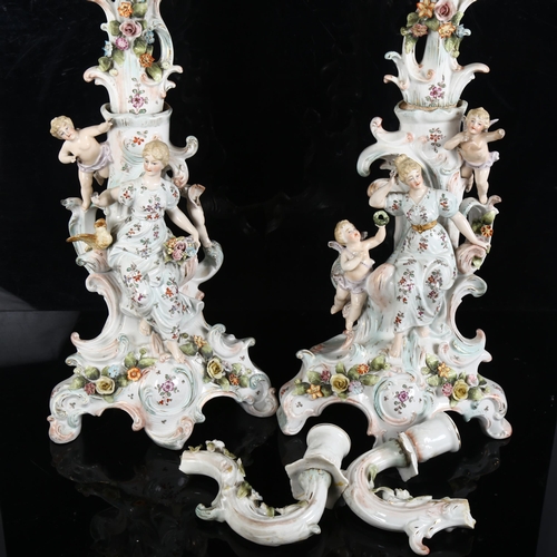 195 - A pair of Antique German 6-branch table candelabras, encrusted with painted flowers, figures and che... 