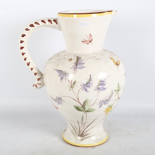 197 - A large West German wash jug, floral decoration, blue back stamp to the base, H35cm