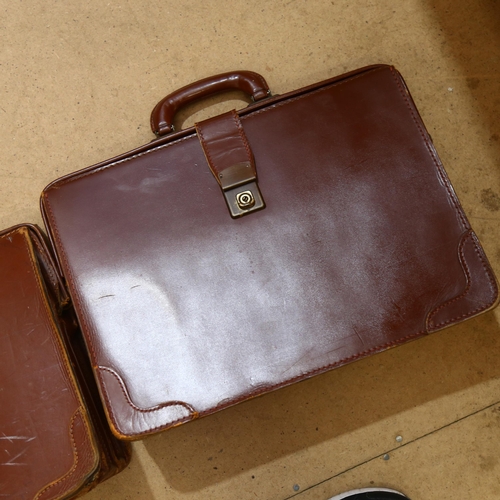 202 - 2 Vintage leather briefcases, 1 with printed script for a Pendragon product