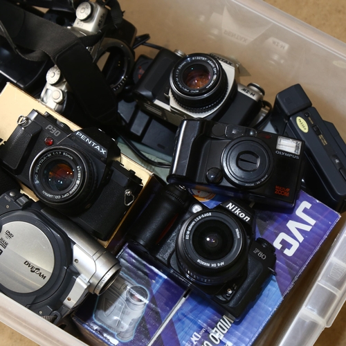 229 - A quantity of various Vintage cameras and equipment, including a Nikon F80 digital camera, a JVC dig... 