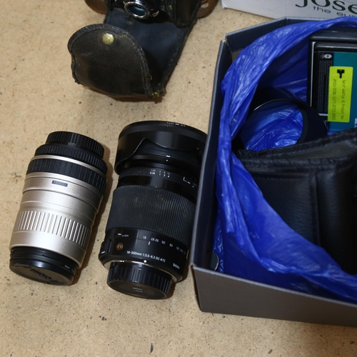 233 - Pentax Sigma camera lenses, photo editing software cds etc.