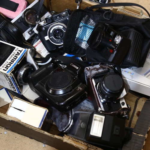 234 - A quantity of Vintage cameras and equipment, including various lenses and accessories