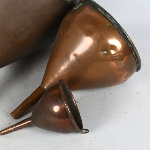 244 - 3 Antique copper funnels, of varying sizes, largest has maker's label W Reeves & Co Brewers and Dist... 