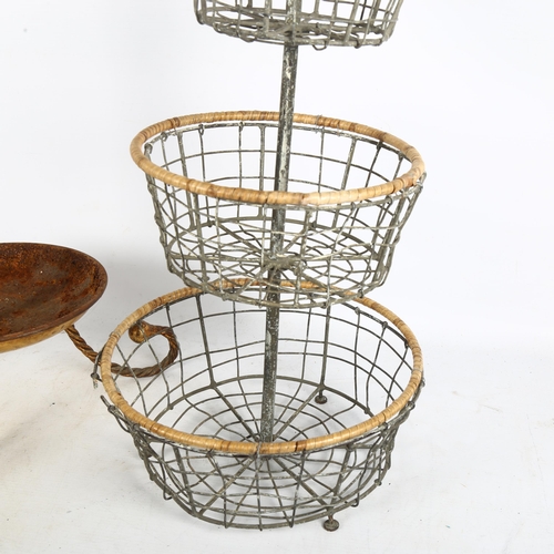 250 - A 3-tier wire bowl vegetable storage stand, and a wrought-metal umbrella/stick stand, H75cm