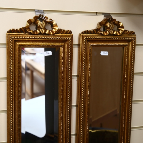 99 - A pair of modern rectangular gilt-framed bevel-edge mirrors of narrow form, with ribbon mount, L122c... 