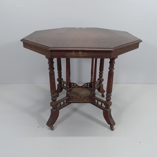 2199 - A Victorian Aesthetic movement mahogany octagonal occasional table, with turned supports and galleri... 