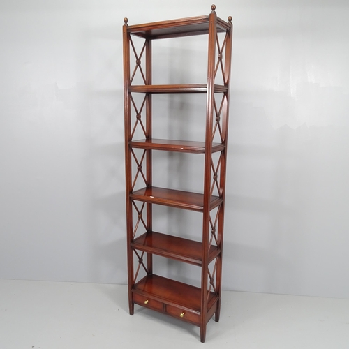 2201 - A modern oriental mahogany six-tier whatnot, with two drawers. 56x187x28cm.