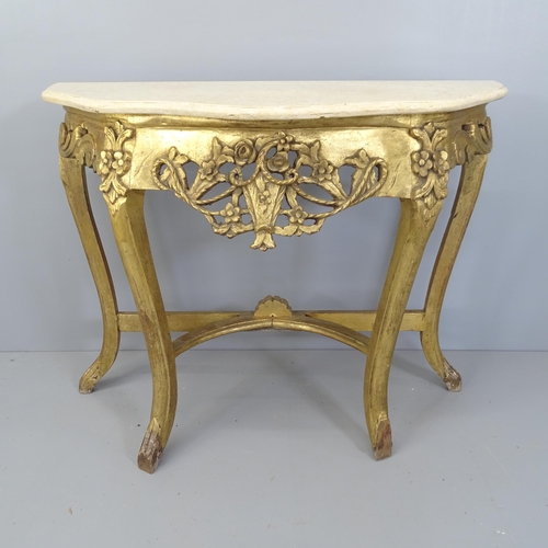 2215 - A continental gilt painted console table of serpentine form, with marble top. 96x78x40cm.