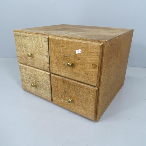 2220 - A vintage oak four drawer filing chest. 49x35x44cm.