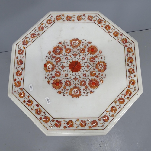 2222 - An octagonal marble-top occasional table on mahogany tripod base, with inlaid mother of pearl decora... 