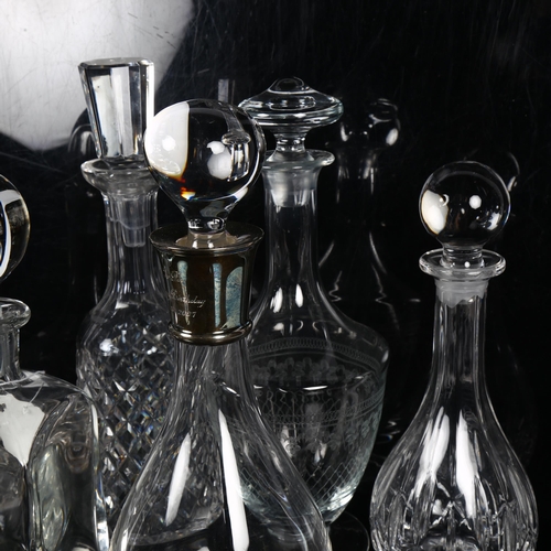 438 - A group of 6 glass decanters and stoppers, including 1 with silver collar, H31cm