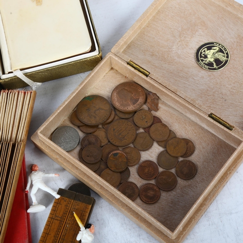 443 - A box of items including pens, money banks, puzzle, bottle and ephemera